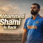 Mohammed Shami in India’s blue ODI jersey during golden hour, standing confidently on a cricket ground with the title “Mohammed Shami Is Back” displayed in bold text.
